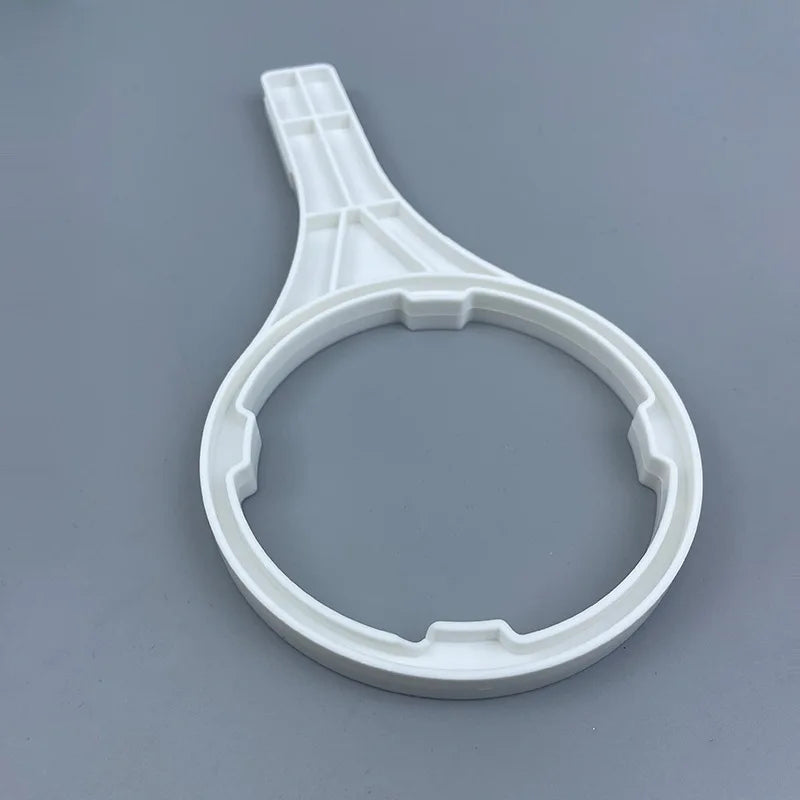 Aqua Zoom 10-inch universal water filter housing wrench for RO systems, heavy-duty bottle opening tool for filter replacement.