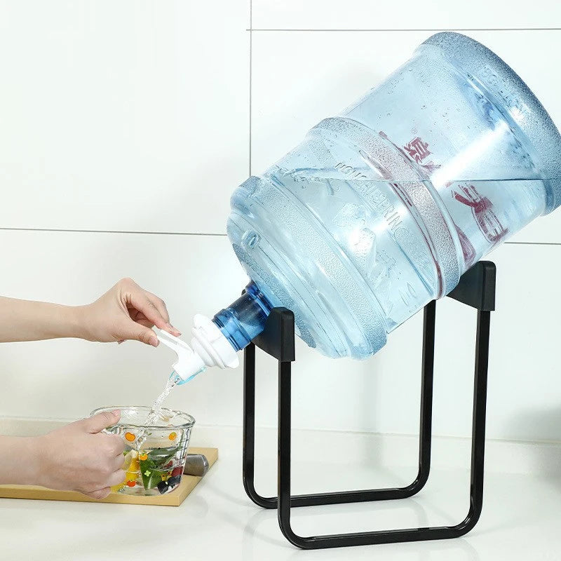 Aqua Zoom portable water bottle stand with tap, holding a 20L water jug for camping or home use, with a durable rack and dispenser.